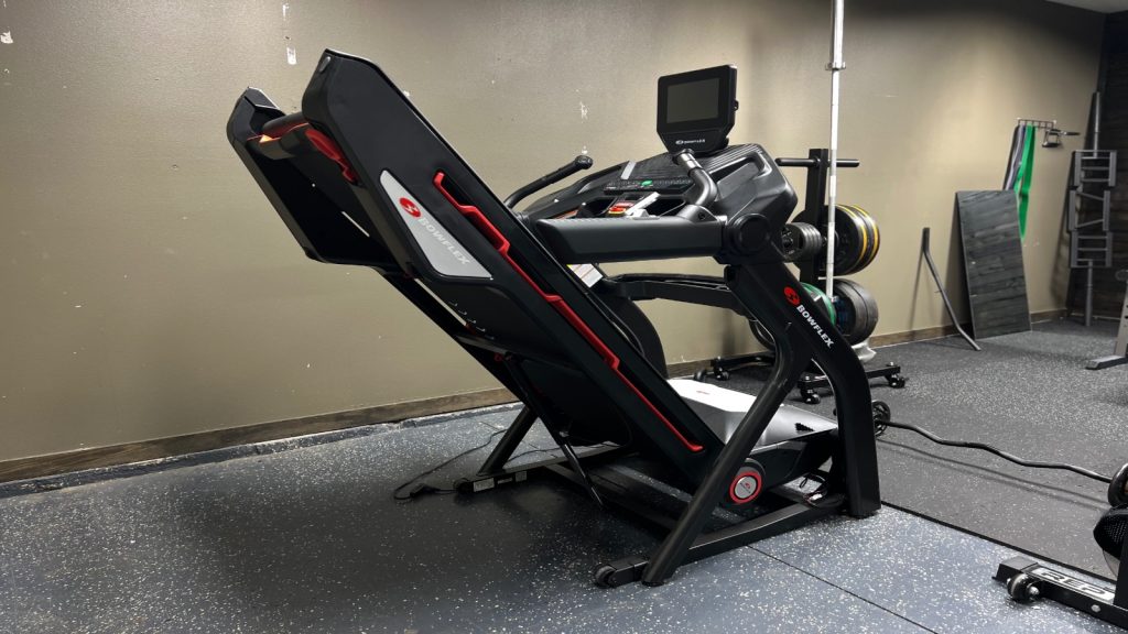 A view of a folded up Bowflex Treadmill. 10.