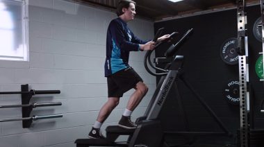 Jake on the elliptical in the Barbend gym.
