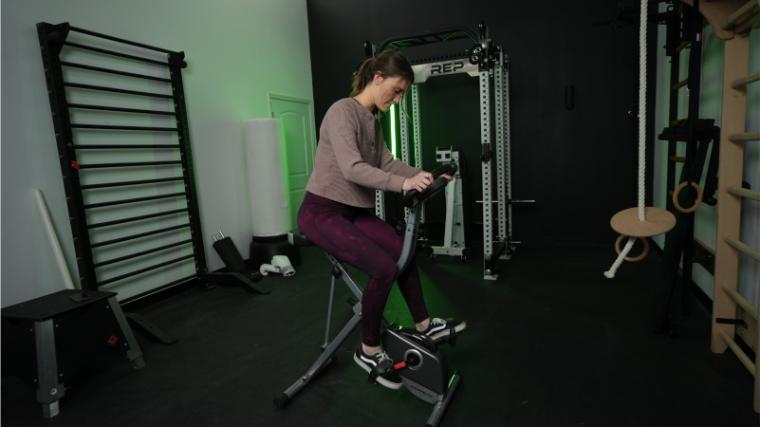 Our BarBend tester riding the Exerpeutic 400XL.