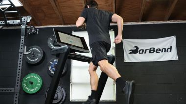 Jake running on a treadmill in the Barbend gym.