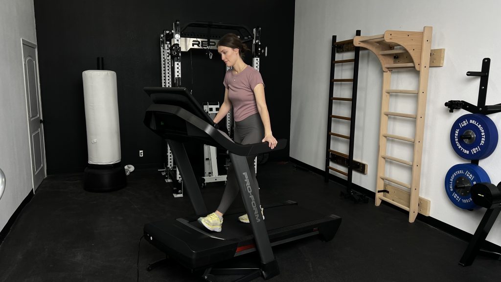 Our BarBend Tester working out on a ProForm Pro 9000 Treadmill.