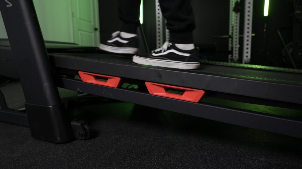 A close up of the red side-decking on a ProForm Carbon TLX treadmill.