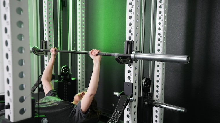 Our tester setting up for a bench press in the REP Fitness PR-5000 Power Rack