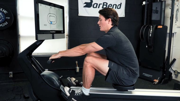 A person performing rowing workouts for beginners.