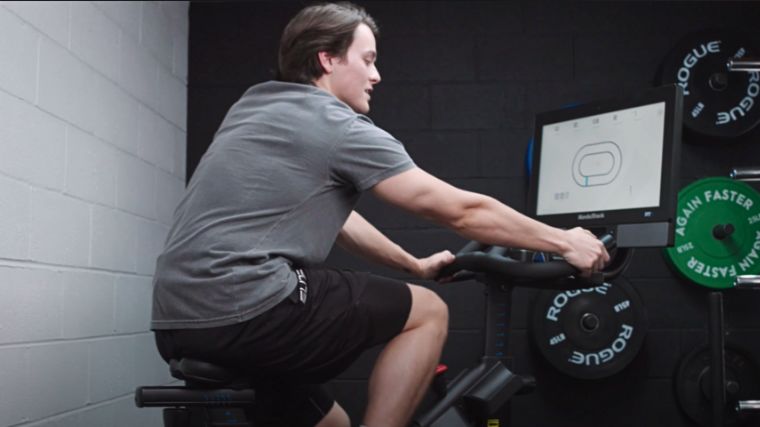 A person working out on an exercise bike.