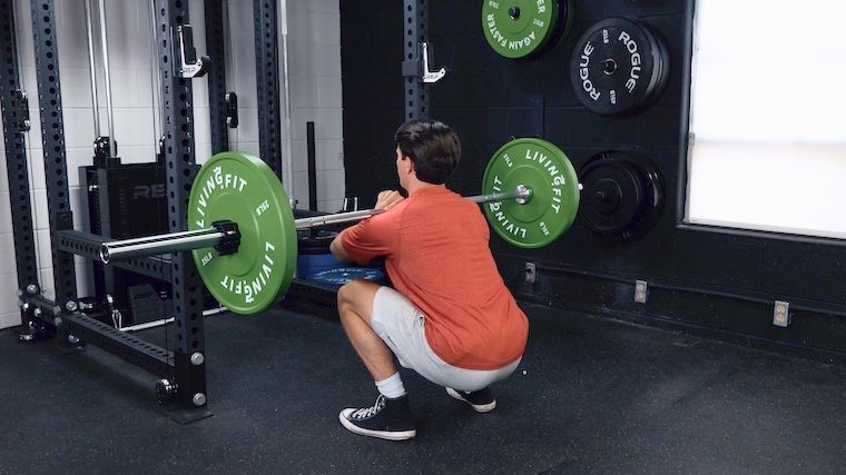 Jake doing the front squat with a barbell. 