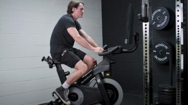 A person doing a HIIT exercise bike workouts.