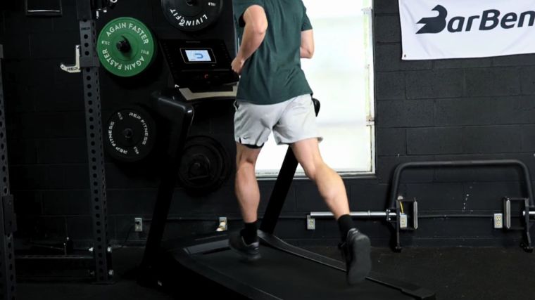 A person running on a treadmill.