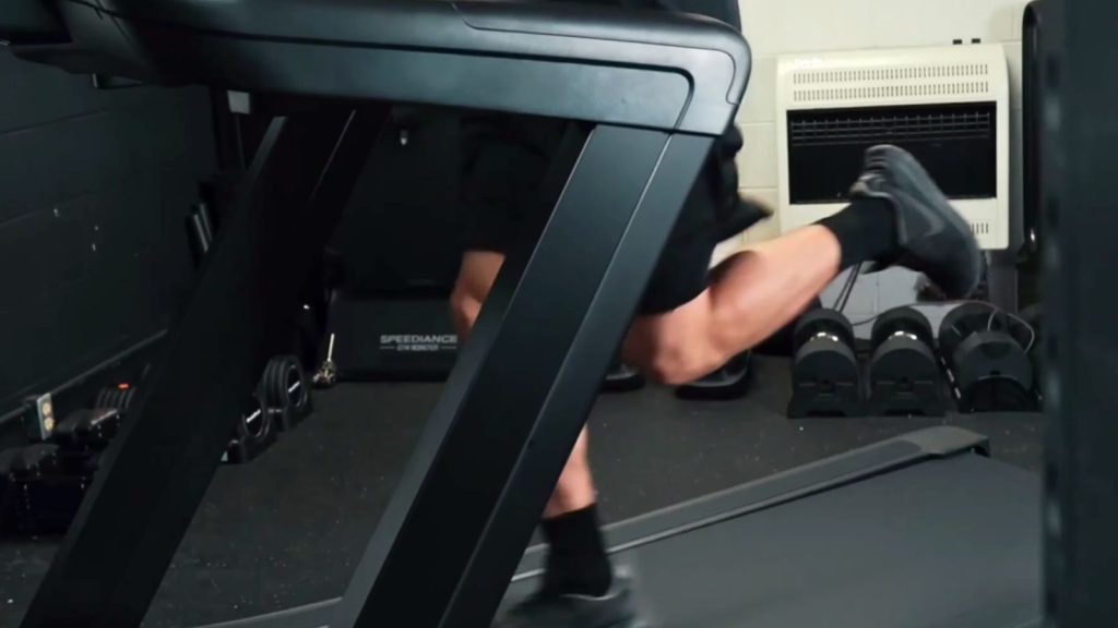 A person running on a treadmill.