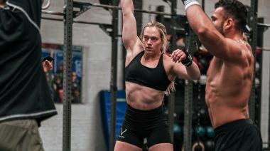 CrossFit star Hannah Black lifting some dumbbells