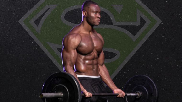 A man performs a barbell curl in front of the Superman emblem.
