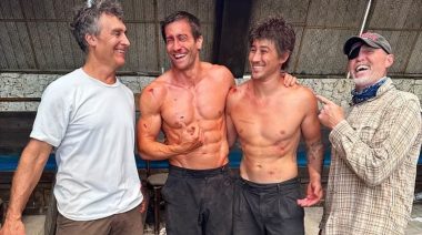 Jake Gyllenhaal with Doug Liman and two others behind the scenes during the filming of Roadhouse.