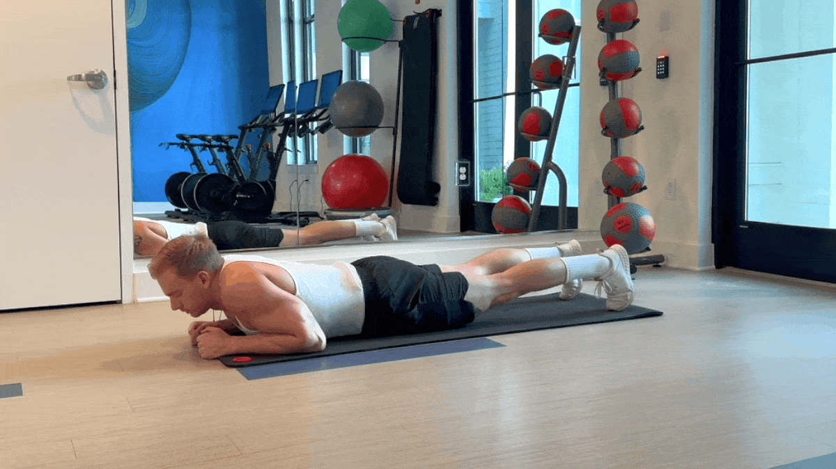 A person performing the plank with the correct form. 