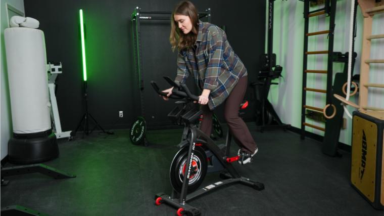 Our tester standing out of the saddle on the similar Schwinn IC4.