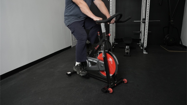 Our tester riding the Sunny Health and Fitness SF-B1002 exercise bike