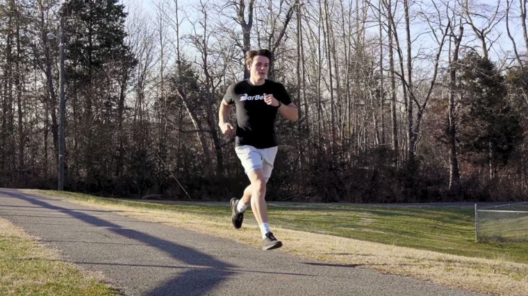 A person running to follow his 5k training plan.