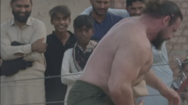 Martins Licis Learns Mud Wrestling in Pakistan