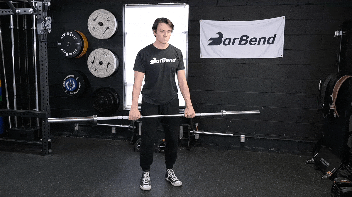 A person doing the barbell upright row.