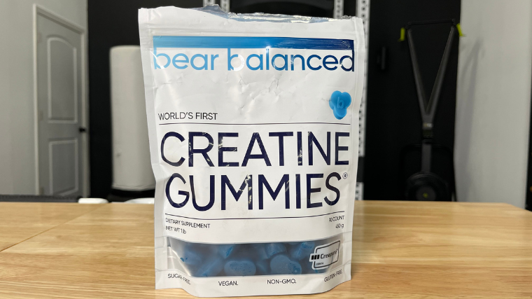 A bag of Bear Balanced Creatine Gummies with the size of gummies compared to a quarter.