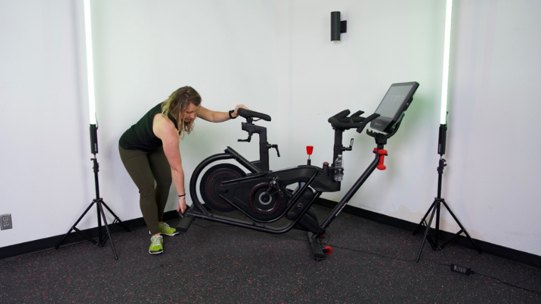 Our tester moves the BowFlex VeloCore Bike.
