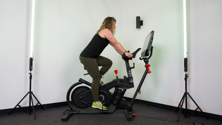 Our tester getting a ride in on the BowFlex VeloCore Bike.