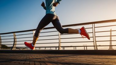 How to Break In Running Shoes: A person running on the street or a sidewalk.