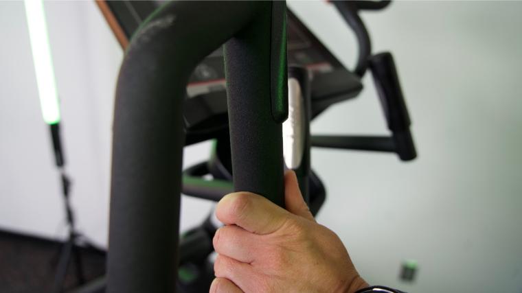 Our tester gripping the handle on the Sole E35 Elliptical.