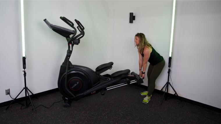 Our tester attempting to move the Sole E35 Elliptical.