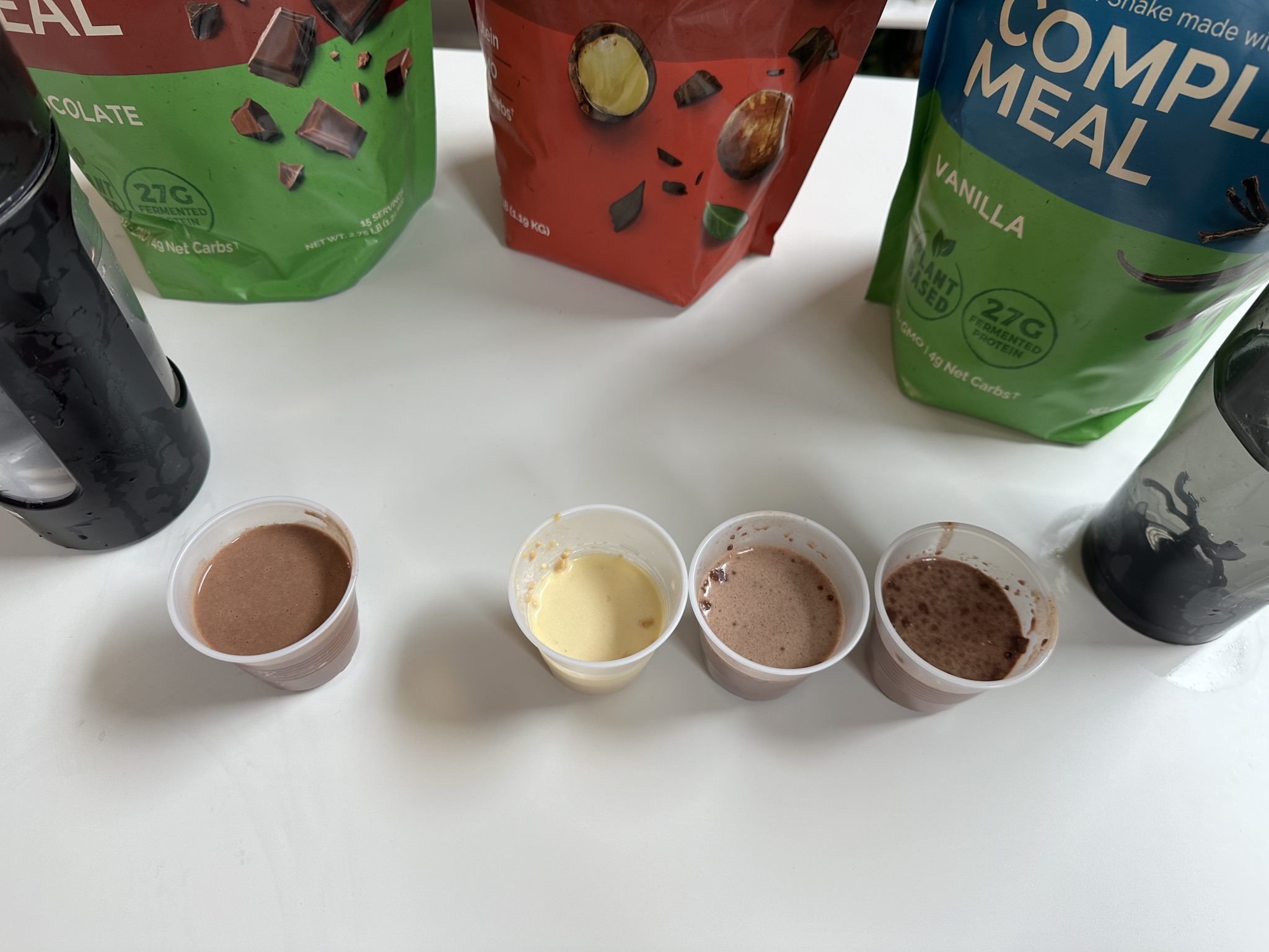 Testing HLTH code meal replacement flavors in shaker cup and blender bottle.