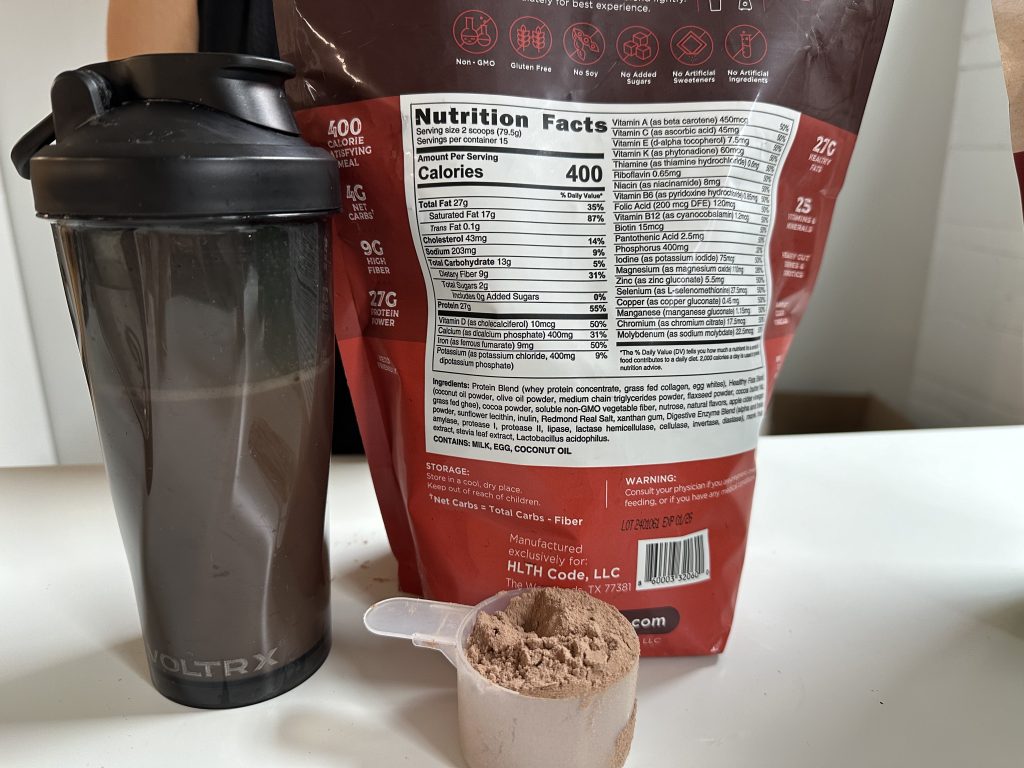 Scoop of HLTH Code Meal Replacement Powder.