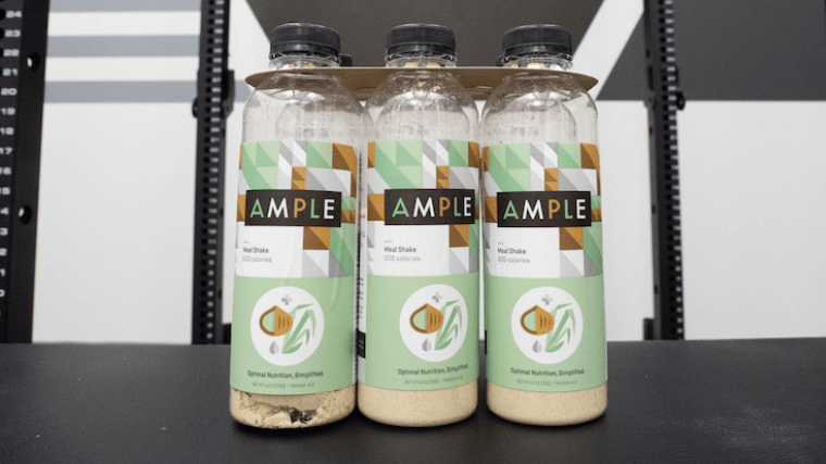 A six pack of Ample Low-Carb Meal Shake in BarBend testing lab