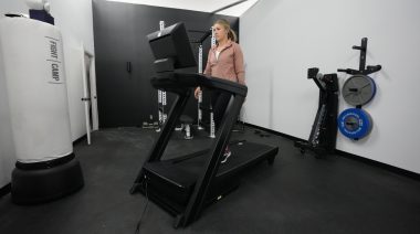 Our tester on one of the best Walmart treadmills.