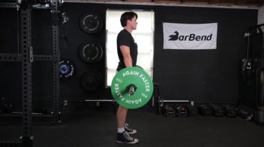 A person deadlifting in the gym.