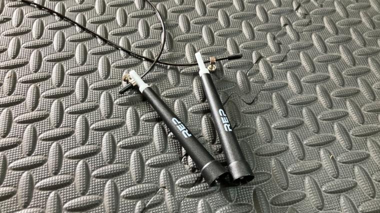 The handles of the REP Fitness Speed Cable Jump Rope.