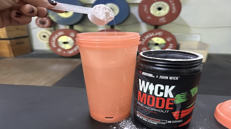 Our tester mixing a scoop of Jacked Factory Wick Mode