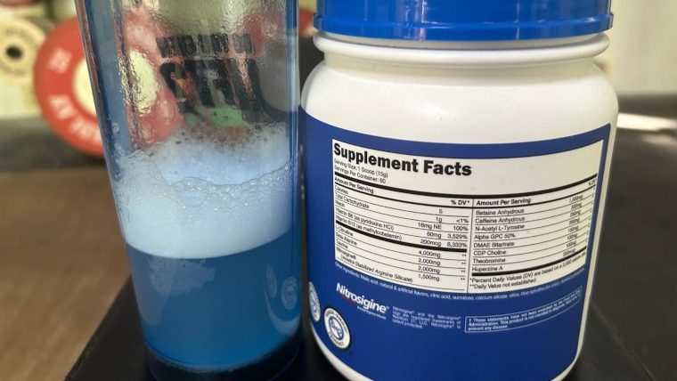 A freshly-mixed batch of Nutricost Pre-Workout with the Supplement Facts label on display.