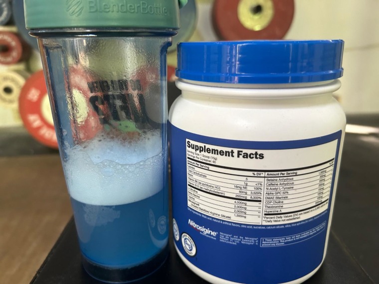 A freshly-mixed batch of Nutricost Pre-Workout with the Supplement Facts label on display.