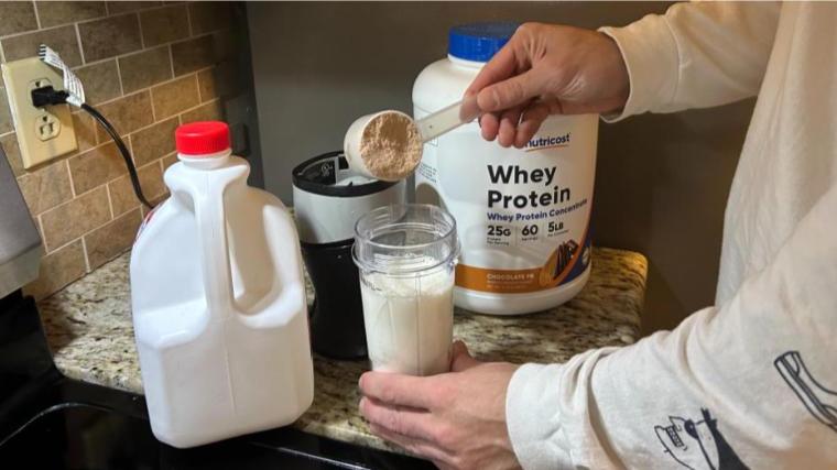 Our tester mixing Nutricost Whey Protein Concentrate.