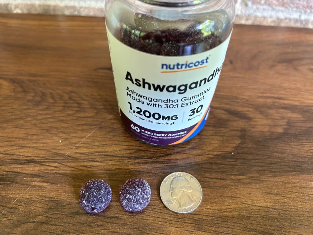 Nutricost Ashwagandha next to a quarter