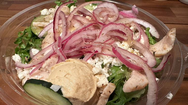 A Panera Bread Mediterranean Chicken Greens With Grains Salad.