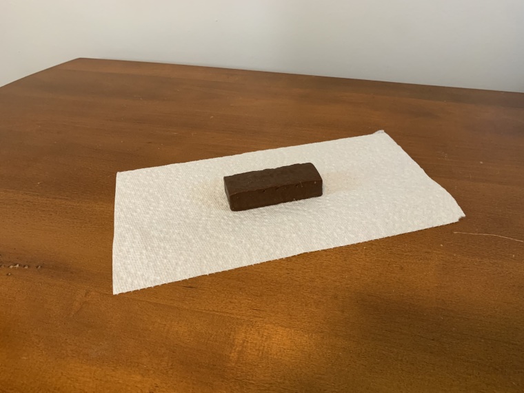 A Pure Protein protein bar on a paper towel.