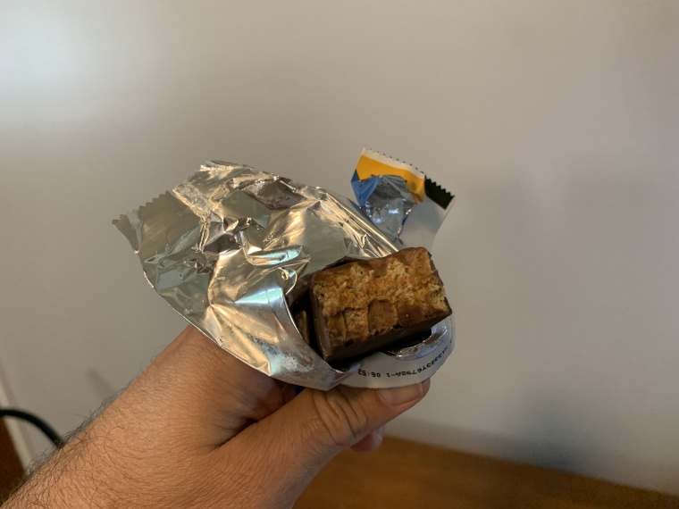 A close look at a protein bar by Pure Protein after a bite is taken out.