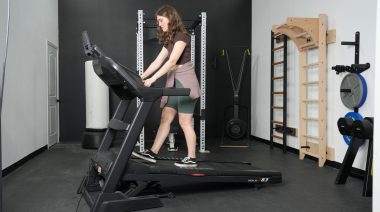 Our tester gets ready for the Sole F63 Treadmill review.