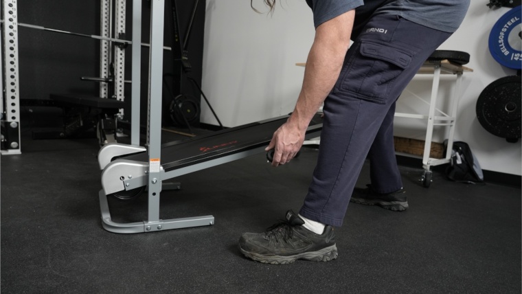 Holding pin for the deck on a Sunny Health and Fitness Manual Treadmill.