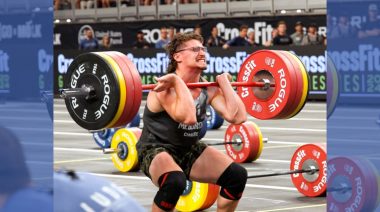 Justin Medeiros performing a clean at the 2024 CrossFit Games.