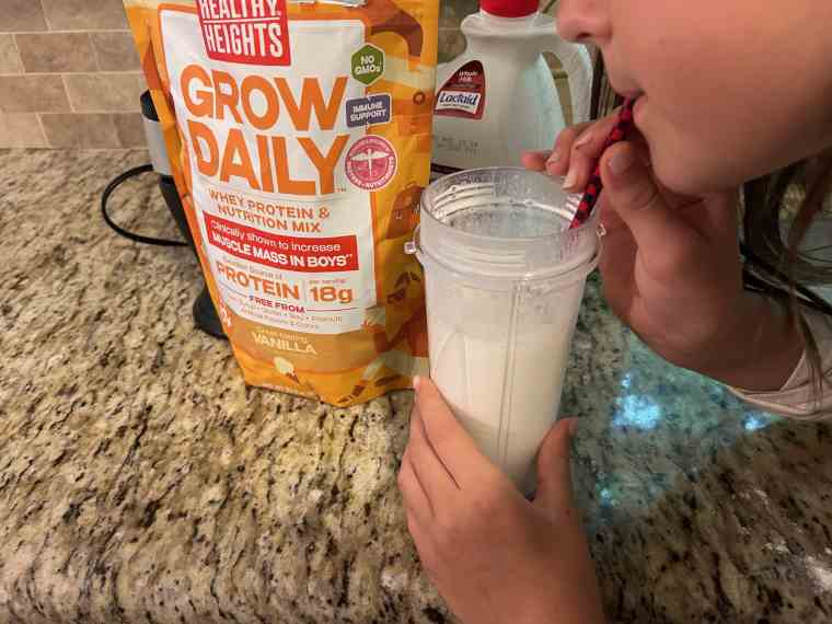 Our tester's kid drinking a protein shake.