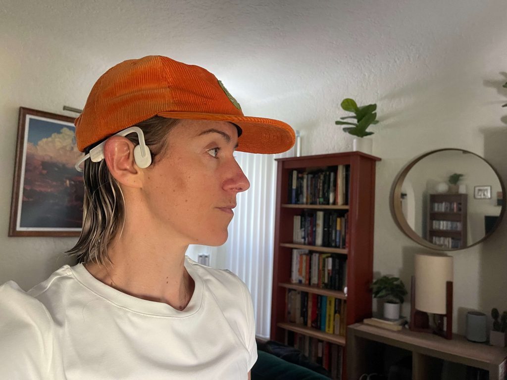 A BarBend tester wearing the SHOKZ Open Move headphones.