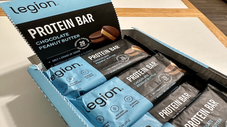 An opened box of Legion Protein Bars