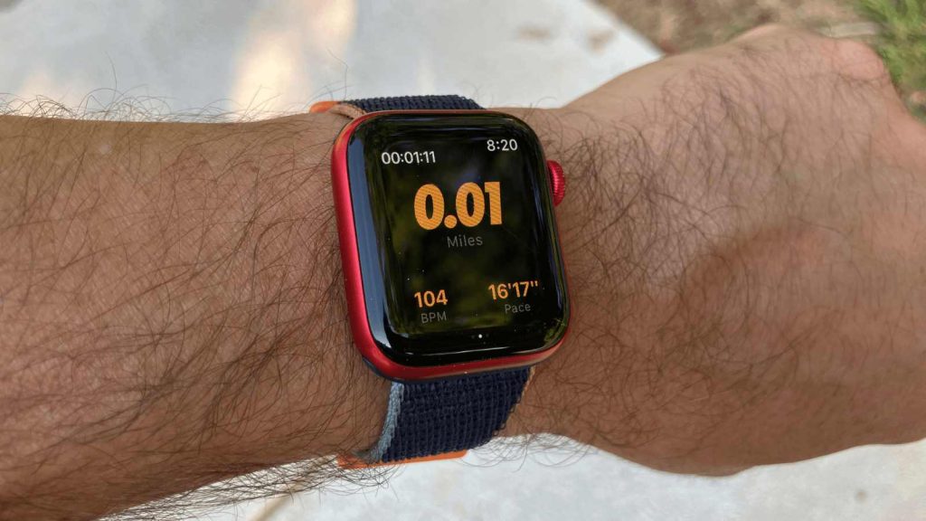 Our tester shows off smart watch features from one of the best walking apps.