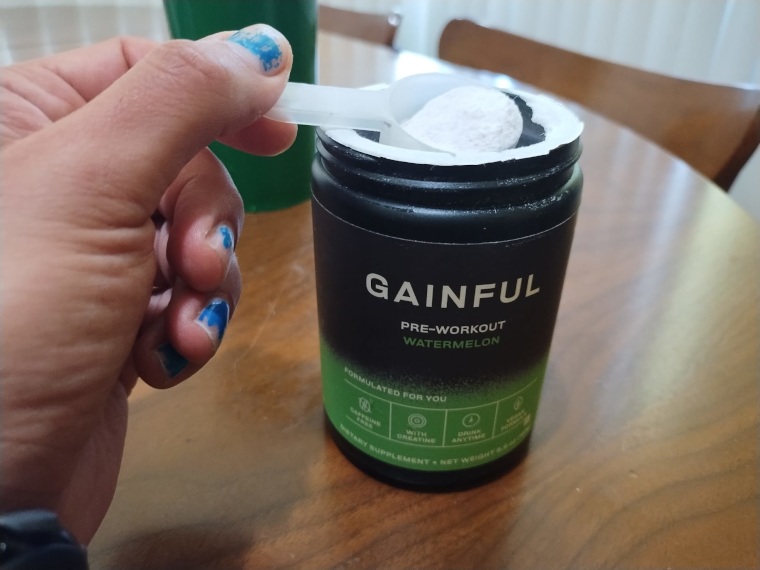 Our tester scoops up some Gainful Pre-Workout.